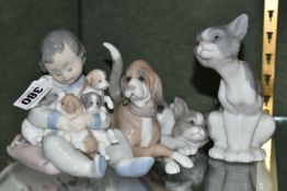 THREE LLADRO FIGURES, comprising New Playmates model number 5456, depicting a boy, dog and