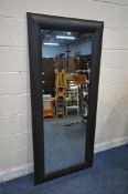 A LARGE RECTANGULAR NEXT FLOOR MIRROR, with brown leather frame, 181cm x 80cm (condition report: