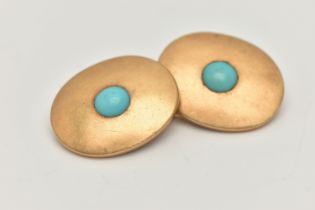 A SINGLE YELLOW METAL CUFFLINK, two oval polished panels each set with an imitation turquoise