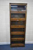 A LAURA ASHLEY GARRAT SIX TIER LIBRARY SECTIONAL TYPE BOOKCASE, with rise and fall glass doors,