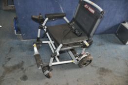 A JOY RIDER ELECTRIC FOLDING WHEEL CHAIR with charger (no key required )(PAT pass and working)