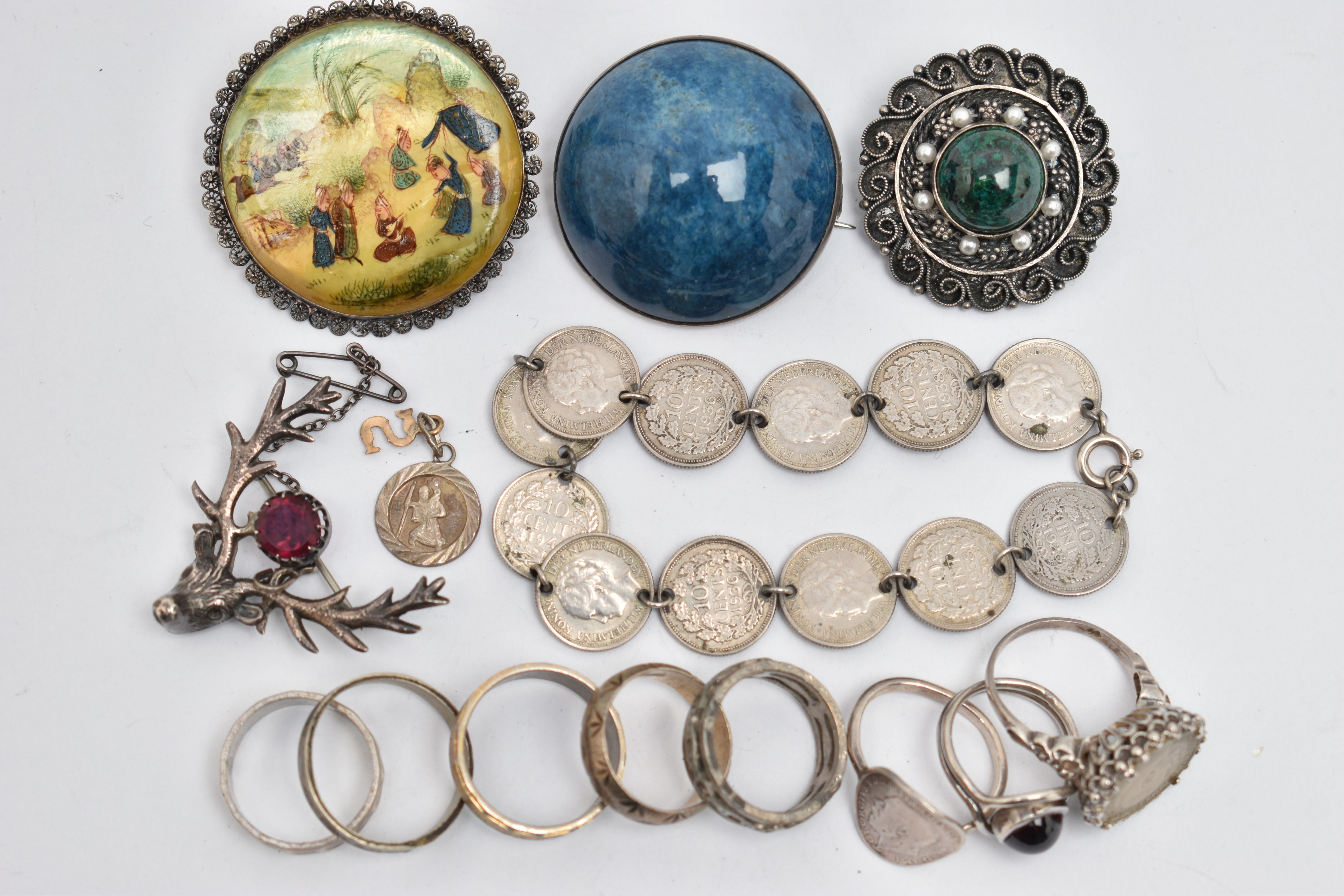 A BAG OF ASSORTED JEWELLERY, to include a large blue cabochon stone brooch, mounted in a white metal