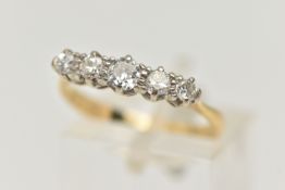 A FIVE STONE DIAMOND RING, two old cut diamonds and three round brilliant cut diamonds,
