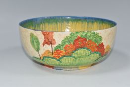 A CLARICE CLIFF PATINA 'COUNTRY' PATTERN BOWL, painted with a country landscape on a textured