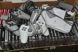 A SONY PLAYSTATION ONE CONSOLE AND GAMES, has over fifty games including Crash Bandicoot (big