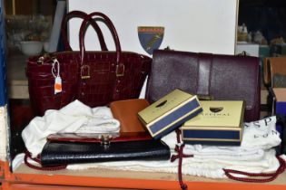 A GROUP OF ASPINAL OF LONDON HANDBAGS AND PURSE, ETC, comprising a claret textured leather bag