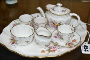 A MINIATURE ROYAL CROWN DERBY 'DERBY POSIES' TEA SET AND SERVING TRAY, comprising an oval serving