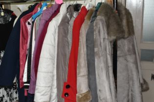 A GROUP TWENTY TWO LADIES' JACKETS, GILETS AND COATS, comprising three modern 'sheepskin' coats, a