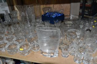 A LARGE QUANTITY OF CUT CRYSTAL AND GLASSWARE, comprising a David Whyman glass vase depicting a