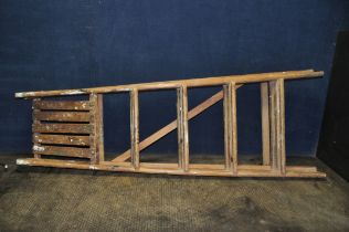 A VINTAGE WOODEN STEP LADDER with four rung to its 147cm height