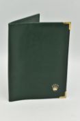 A ROLEX GREEN LEATHER WALLET, various card or reciept compartments to the interior, stamped 'Montres