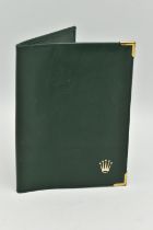 A ROLEX GREEN LEATHER WALLET, various card or reciept compartments to the interior, stamped 'Montres