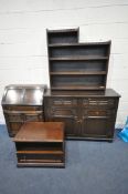 A SELECTION OF DARK OAK FURNITURE to include a dresser of two short drawers over two cupboard doors,