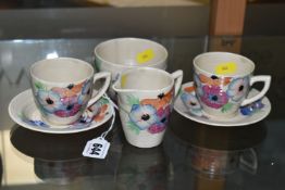 A SIX PIECE CLARICE CLIFF 'ANEMONE' PART TEA SET, comprising two teacups and saucers, a cream jug