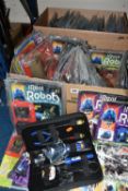 TWO BOXES OF ULTIMATE REAL ROBOTS PARTWORKS, approximately sixty pieces most sealed with robot