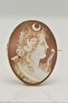 A CAMEO BROOCH, a shell cameo depicting a lady in profile, collet set in yellow metal, approximate