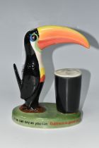 A HAND PAINTED CARLTON WARE GUINNESS ADVERTISING 'TOUCAN' TABLE LAMP, a mid-20th century Guinness