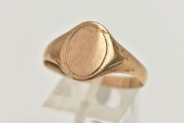 A 9CT YELLOW GOLD SIGNET RING, of an oval form, worn engraving, misshapen shank, hallmarked 9ct