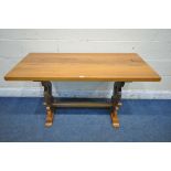 A 20TH CENTURY ELM REFECTORY TABLE, on trestle legs, united by a block stretcher, length 128cm x
