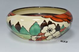A CLARICE CLIFF FANTASQUE 'LIMBERLOST' PATTERN BOWL, shape 55, painted with flowers and trees in a