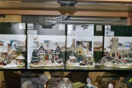FOUR BOXED LILLIPUT LANE ILLUMINATED COTTAGES COLLECTION SNOW COTTAGES, comprising 'Christmas