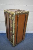 A LIGHT BROWN STEAMER TRUNK, with brass and wooden banding, length 111cm x 55cm x height 56cm (