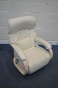 A HIMOLLA MOSEL ELECTRIC RECLINER ARMCHAIR, with cream leather upholstery, on a swivel base, width