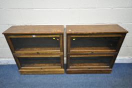 A PAIR OF TWO TIER LAURA ASHLEY GARRAT LIBRARY SECTIONAL TYPE BOOKCASE, with rise and fall glass