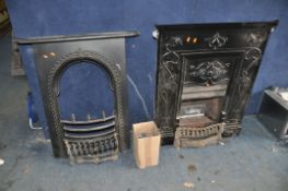 TWO CAST IRON FIRE INSERTS one with gas fire fittings in Art Nouveau style with a box of 'coals'