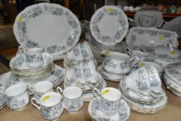 A GROUP OF ROYAL ALBERT 'SILVER MAPLE' PATTERN DINNERWARE, comprising two covered tureens, two