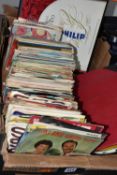 ONE BOX OF SINGLE RECORDS, over one hundred and sixty single records to include artists Val
