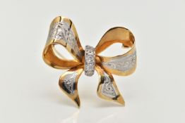 A BI COLOUR DIAMOND BROOCH, designed as a yellow metal bow with white metal and engraved detail, set