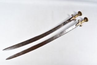 TWO EIGHTEENTH OR NINETEENTH CENTURY INDIAN TULWAR SWORDS, both of them feature a spike finial at