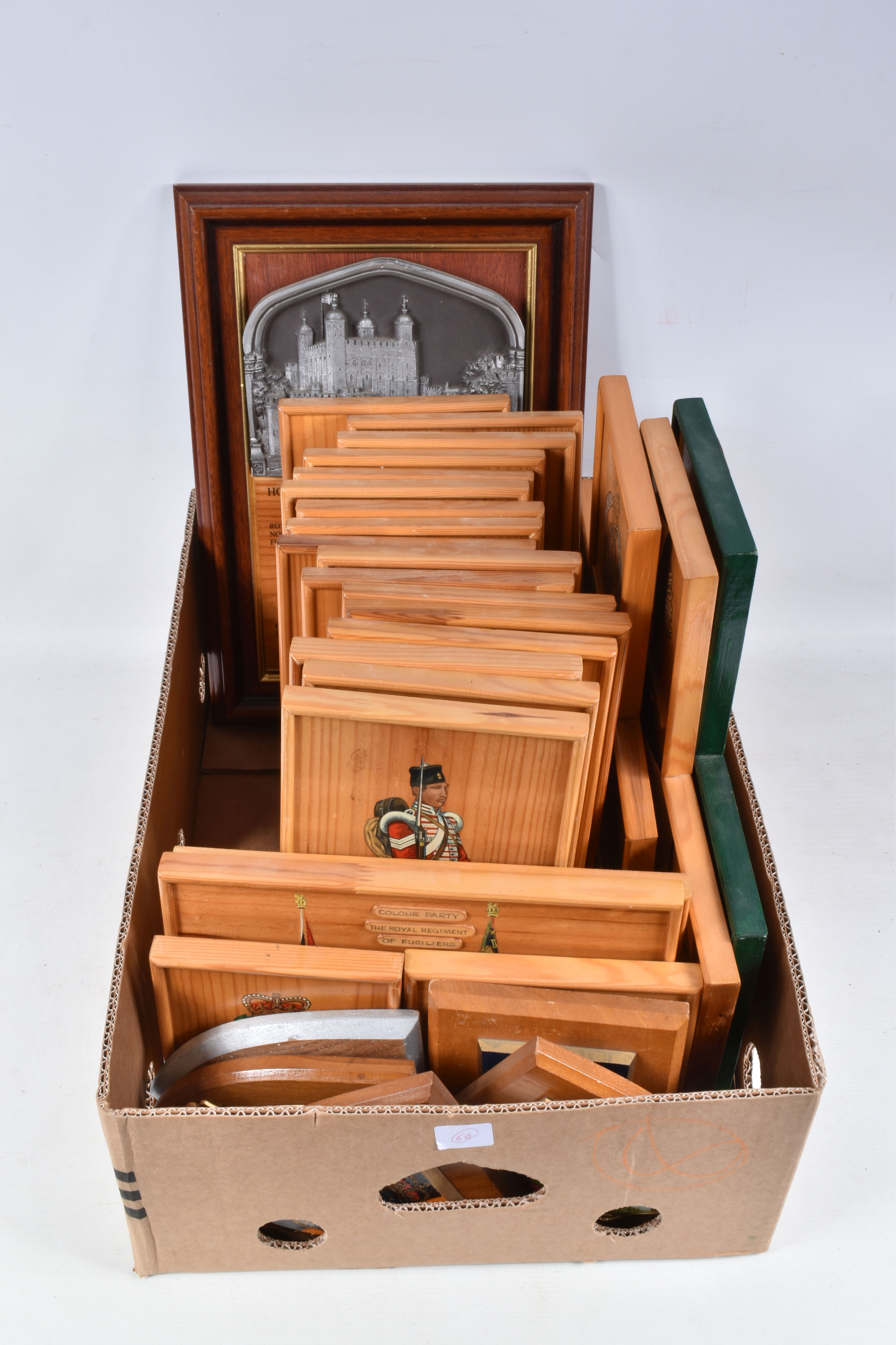 A BOX OF THIRTY WOODEN MOUNTED PLAQUES AND PICTURES OF REGIMENTAL SHIELDS AND UNIFORMS, ETC, many