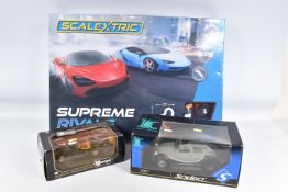 A BOXED SCALEXTRIC SUPREME RIVALS SET, No.C1407, appears complete and in good condition with both