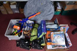 A LARGE QUANTITY OF BOARD GAMES, CAMPING GEAR, COMBAT TOYS ETC, to include a selection of Nerf
