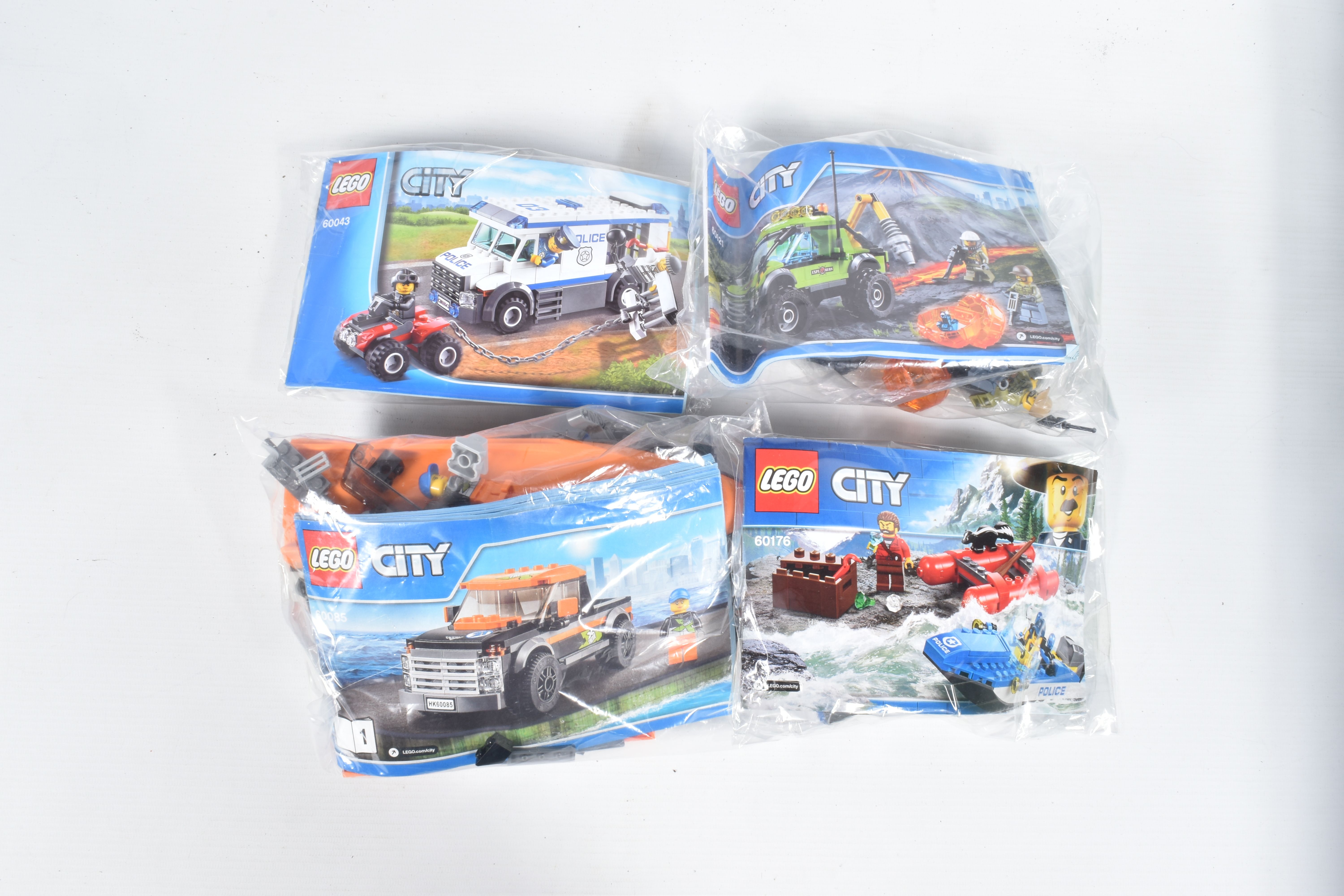 A COLLECTION OF ELEVEN UNBOXED LEGO CITY MODELS, each individually sealed with some models built, - Image 4 of 7