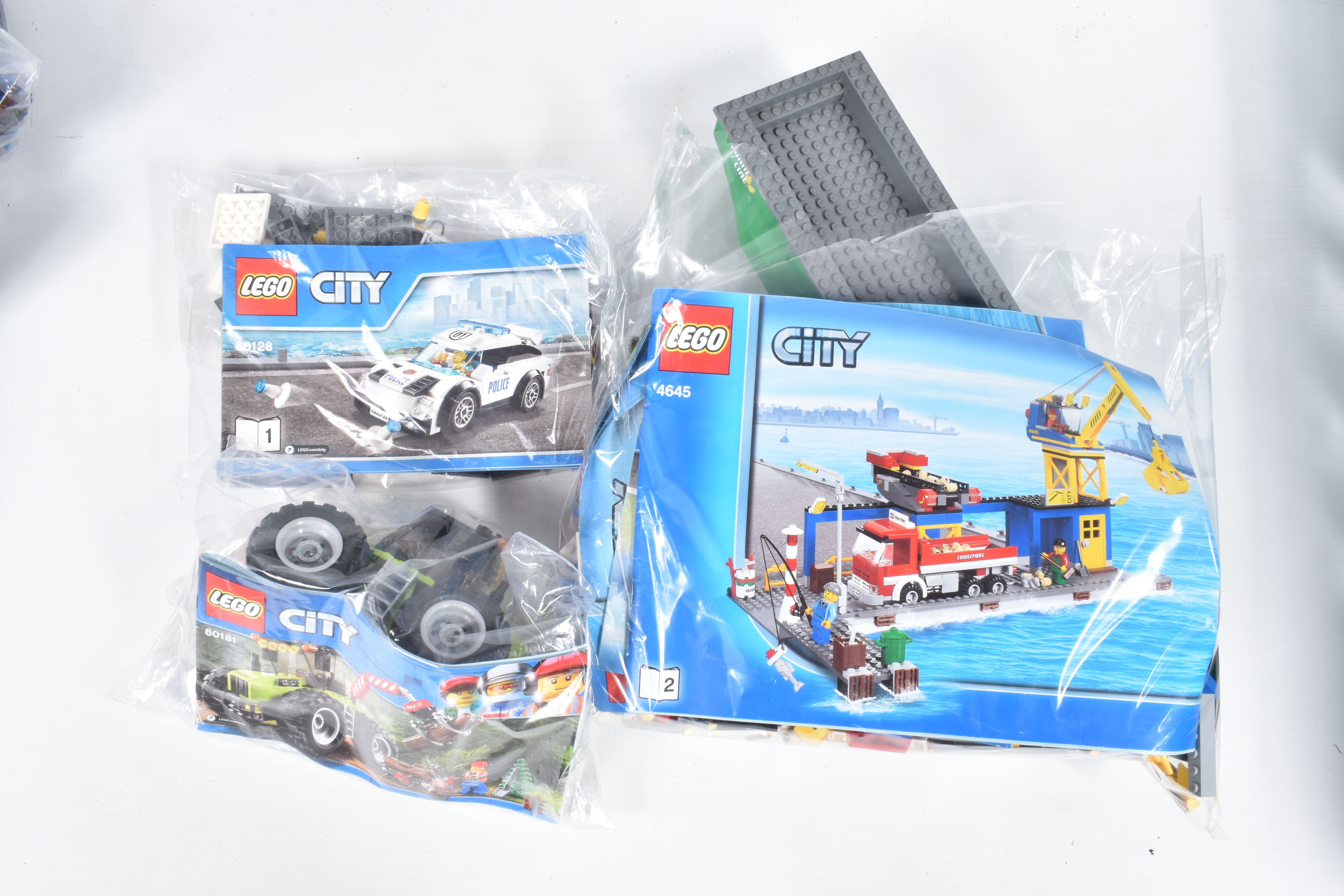 A COLLECTION OF ELEVEN UNBOXED LEGO CITY MODELS, each individually sealed with some models built, - Image 2 of 7