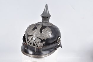 A WWI ERA PRUSSIAN PICKELHAUBE WITH LINER AND CHINSTRAP, this has the Prussian eagle on the front