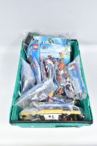 A COLLECTION OF ELEVEN UNBOXED LEGO CITY MODELS, each individually sealed with some models built,