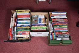 THREE BOXES OF FOOTBALL INTEREST HARDBACK AND PAPERBACK BOOKS, approximately one hundred titles,