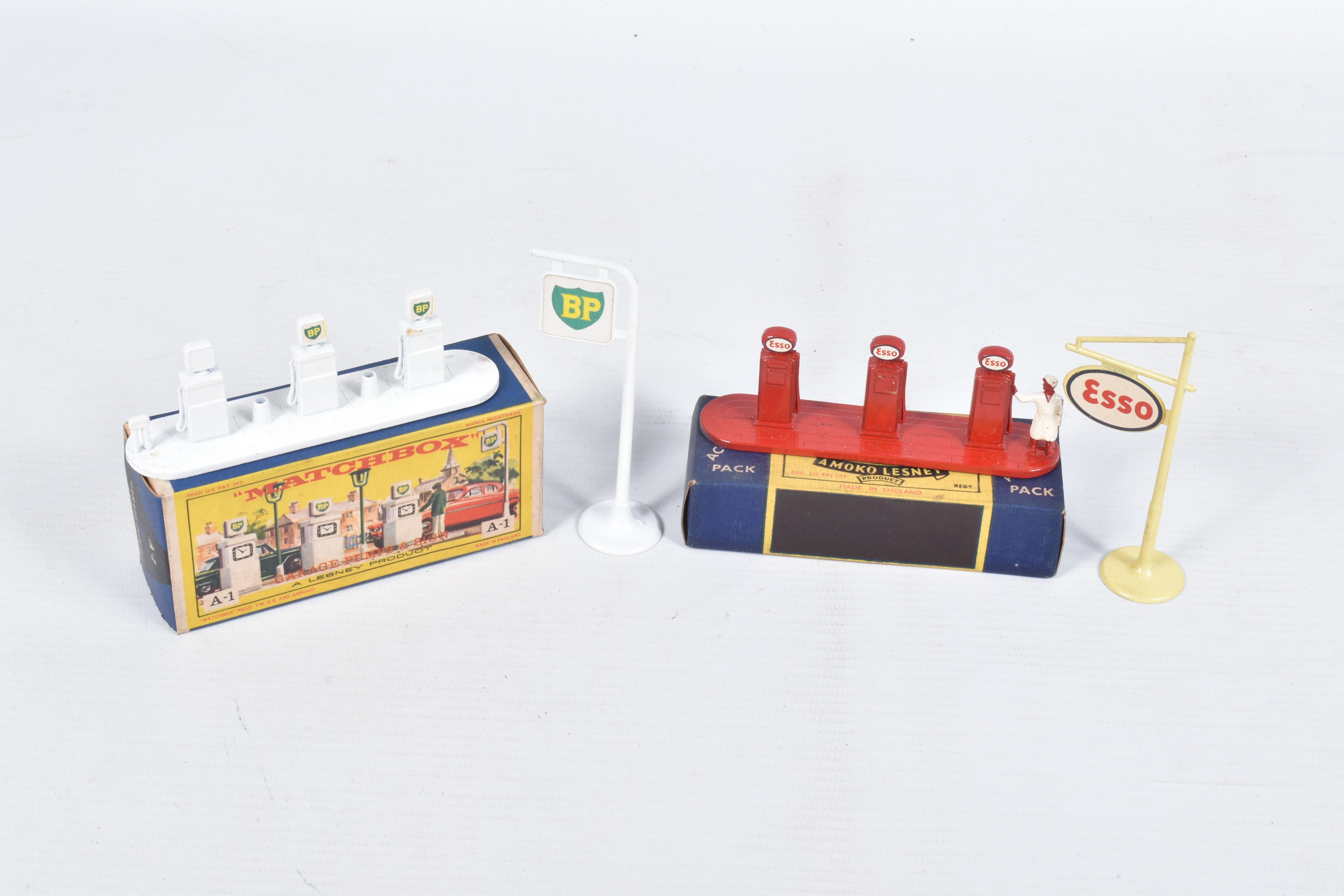 TWO BOXED LESNEY MATCHBOX ACCESSORY PACKS, Esso Petrol Pump set, No.1 and B.P. Garage Pumps and sign