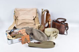 A QUANTITY OF MILITARY RELATED ITEMS, this lot includes a cased set of binoculars with a large broad