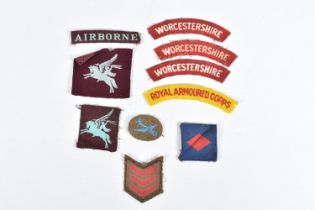 A SMALL COLELCTION OF WWII AND LATER CLOTH INSIGNIA, this lot includes a rare original British