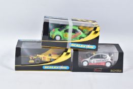 TWO BOXED SCALEXTRIC MODELS AND ONE OTHER, includes a VW Beetle Castrol no.12 in green, C2337,
