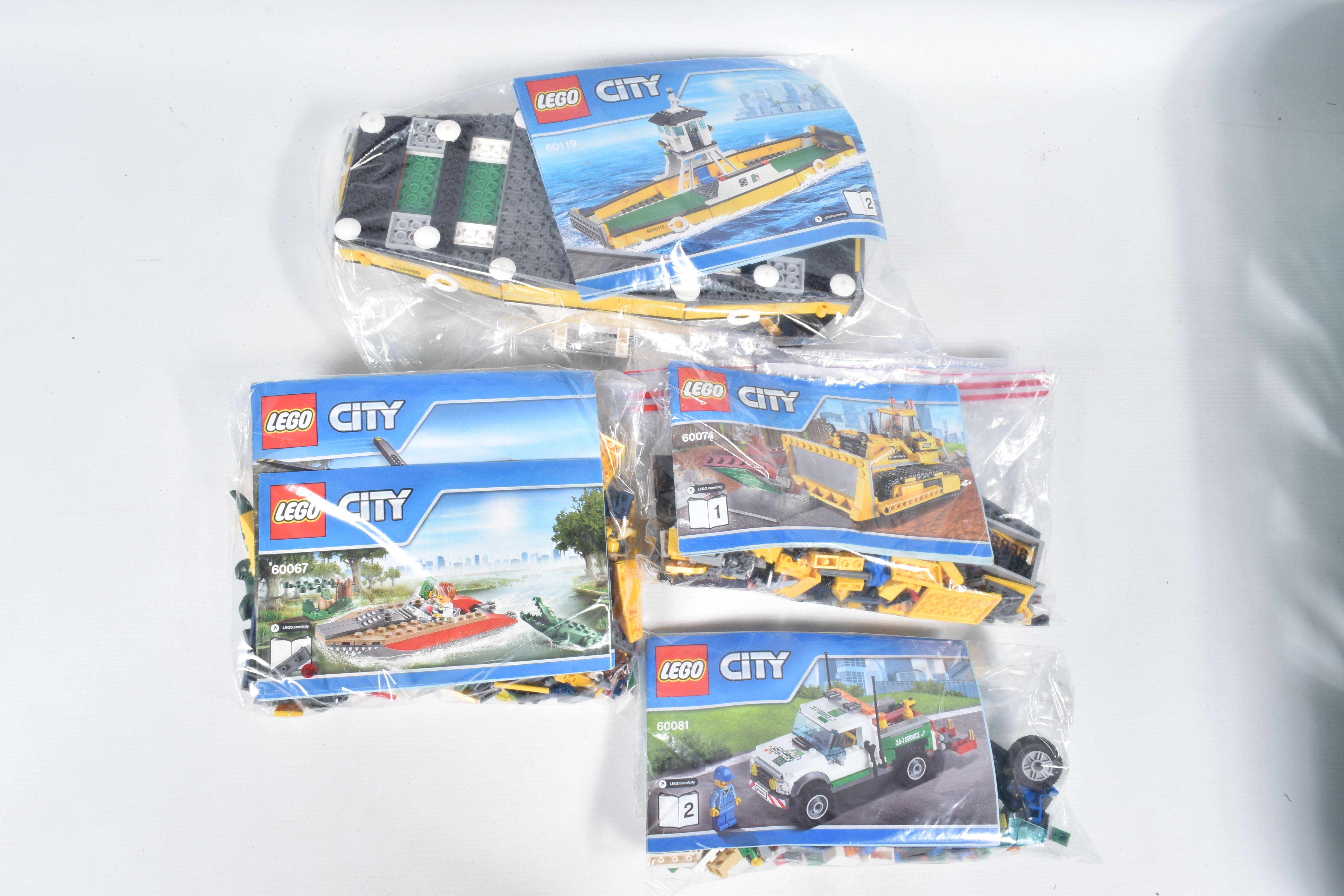 A COLLECTION OF ELEVEN UNBOXED LEGO CITY MODELS, each individually sealed with some models built, - Image 6 of 7