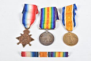 A WWI TRIO OF MEDALS AND A RIBBON BAR, the medals are all named to 1784 DVR/GNR H.W.Wager R.F.A/R.A,