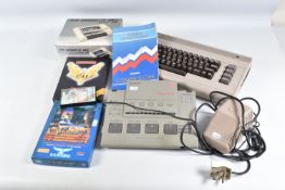 A COMMODORE 64 COMPUTER, TAPE PLAYERS AND A SMALL QUANTITY OF GAMES, games include Club Record