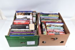 TWO BOXES OF FOOTBALL INTEREST HARDBACK AND PAPERBACK BOOKS, approximately fifty six titles covering