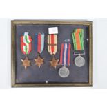 A FRAMED SET OF WWII MEDALS, to include 1935-45 star, 1939-45 war medal, defence medal Italy star,